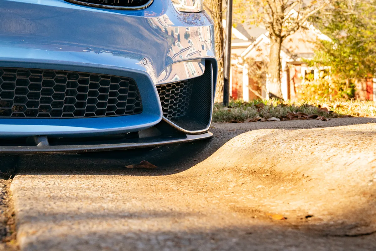 Smooth Curb Bmw Before 2 BMW approaching steep driveway curb without Smooth Curb ramp