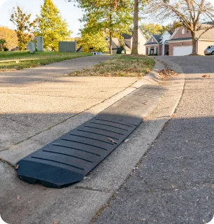 Smooth Curb driveway ramp close-up view