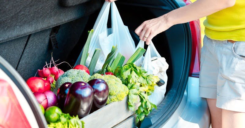 groceries getting taken out of a car