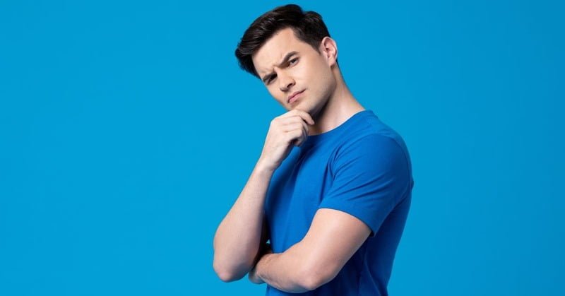 a person with a blue shirt thinking