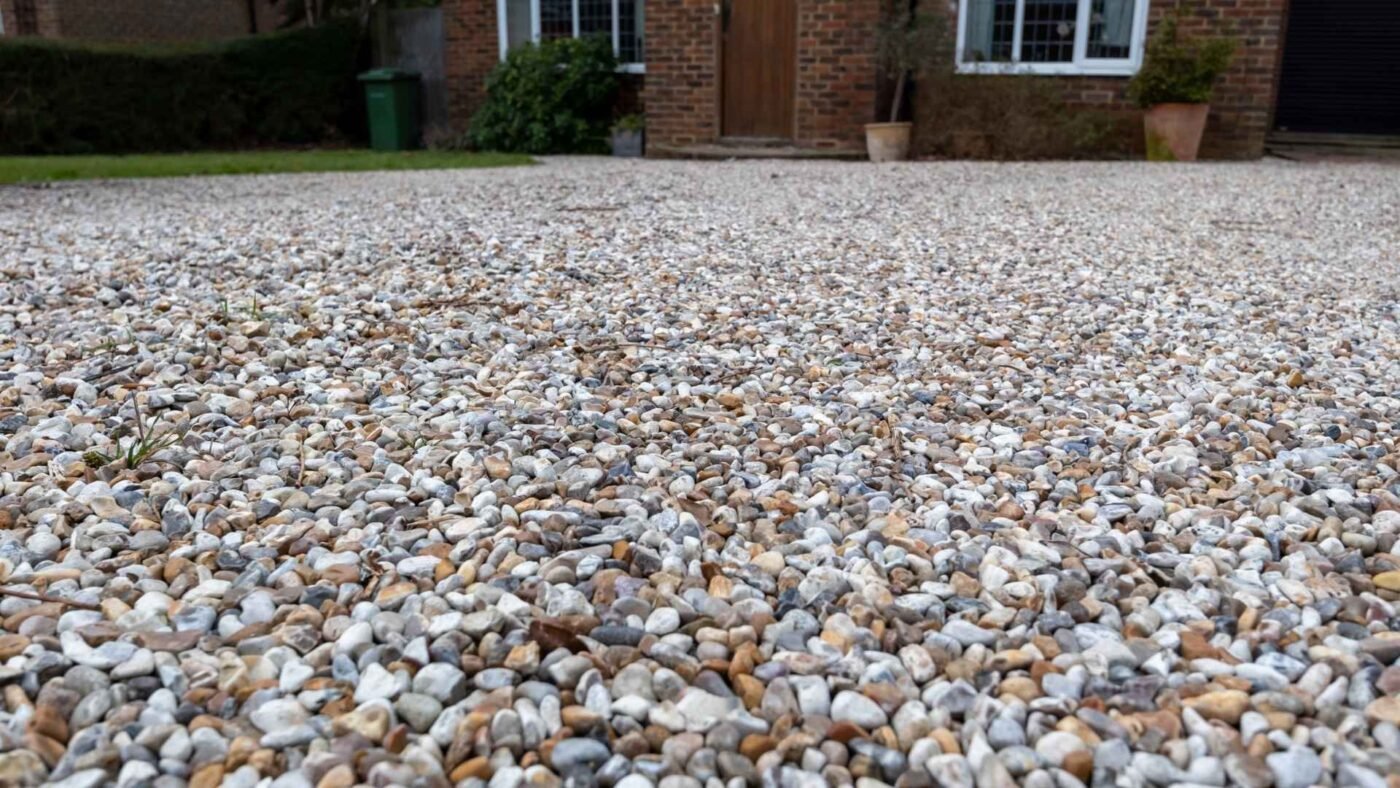 What Are The Key Differences Between Gravel And Asphalt Driveway Materials