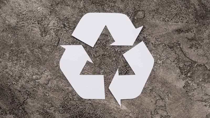 White Symbol Of Recycling On Dirty Background