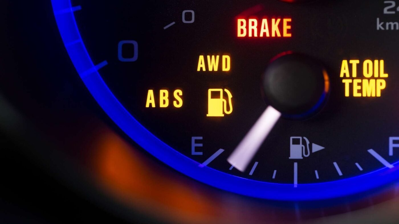 Close Up On Fuel Level Gauge In Vehicle Vsc And Your Driveway