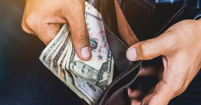 looking at one's wallet