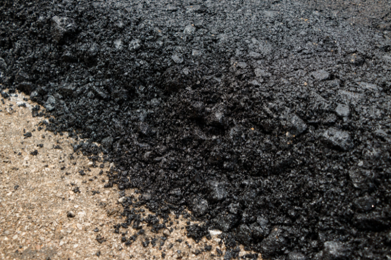 Close-up asphalt on the driveway under construction - Driveway Ramp Install Kit