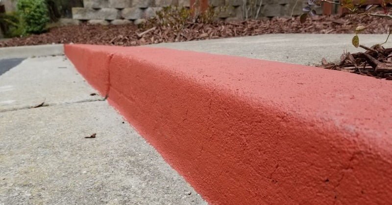 curb that's being highlighted by its height